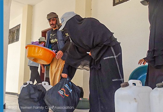 Distributing Rapid Response Mechanism (RRM) kits to newly Internally Displaced Persons (IDPs) for the fifth stage in Ataq district - Shabwah Governorate.