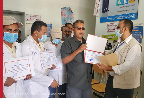 YFCA represntor honors Qatabah health director and AlSalam HWs.